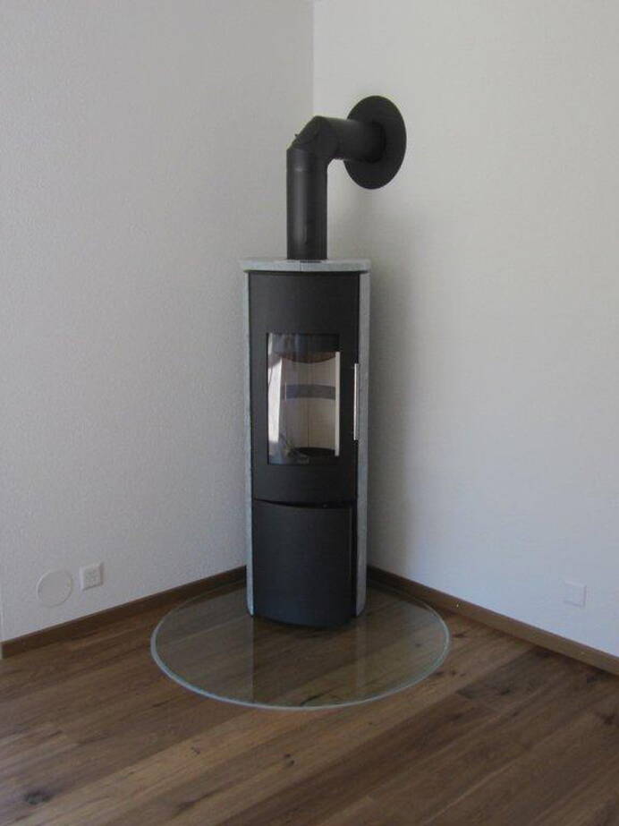 Poêle Cheminée Hark 106 H GT ECOplus Pierre naturelle, pierres d'accumulation inclus Exemple d’installation