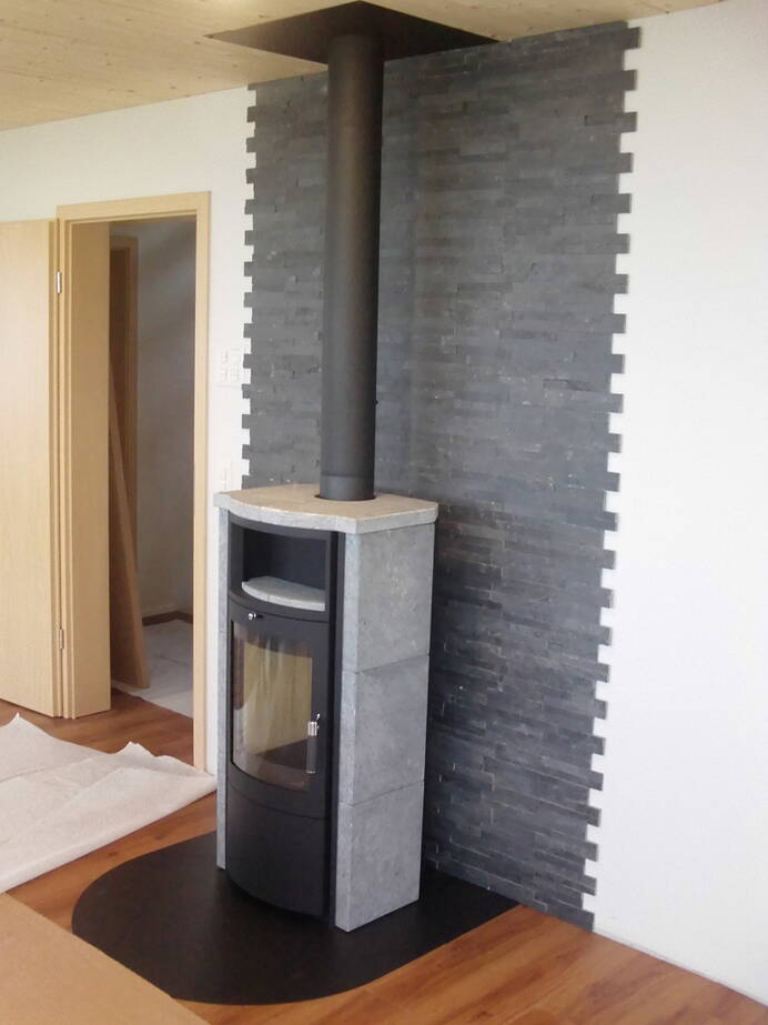 Poêle Cheminée Hark 57 EX ECOplus Pierre naturelle Exemple d’installation
