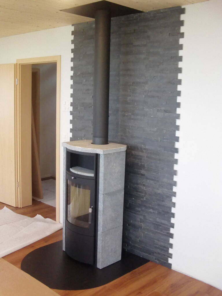 Poêle Cheminée Hark 57 EX ECOplus Pierre naturelle Exemple d’installation