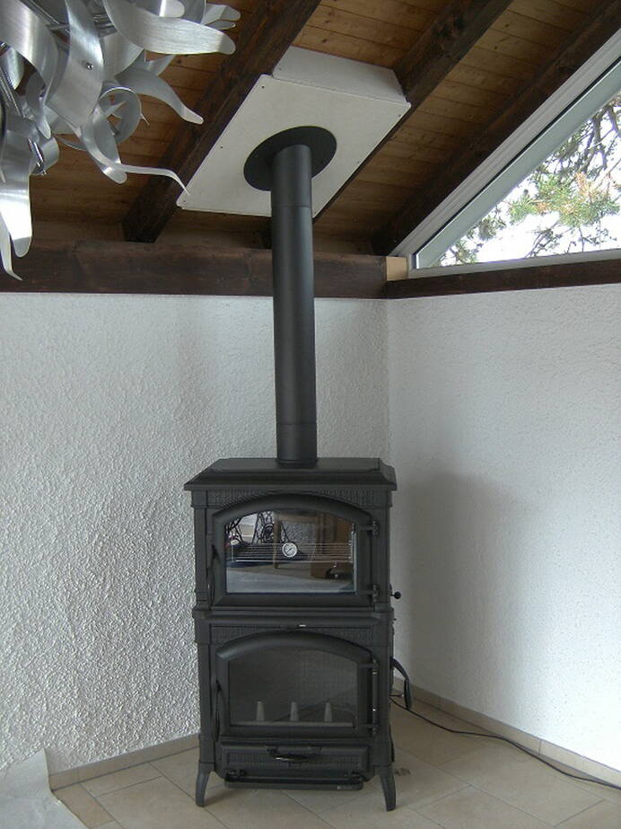 Poêle Cheminée Isotta Forno Fonte noir Exemple d’installation