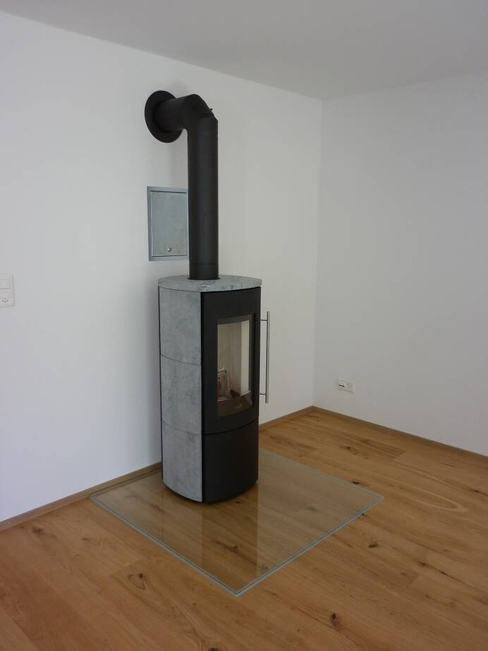 Poêle Cheminée Hark 105 GT ECOplus Pierre naturelle Exemple d’installation
