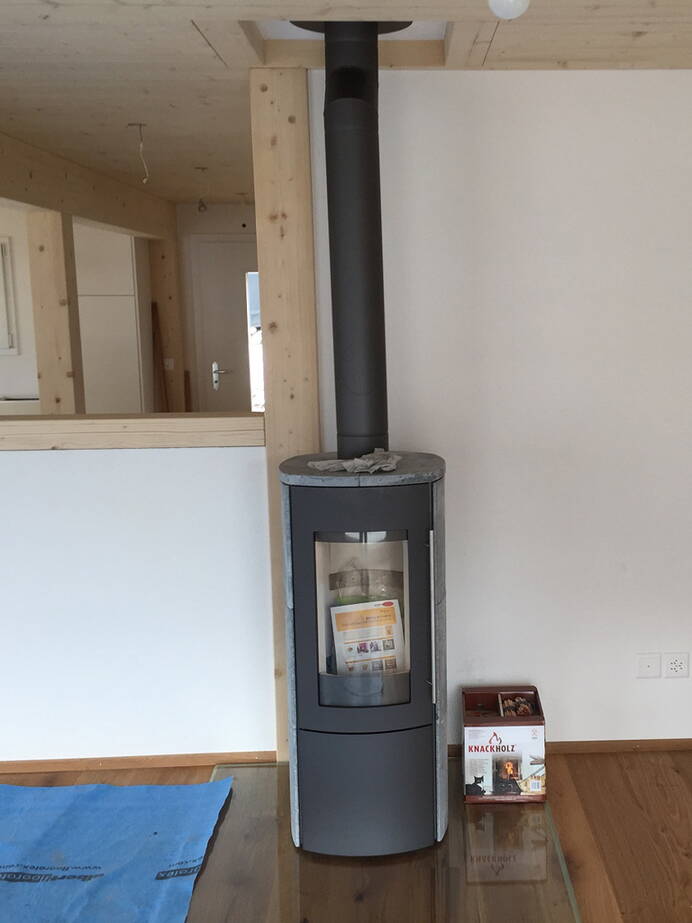 Poêle Cheminée Hark 105 GT ECOplus Pierre naturelle Exemple d’installation