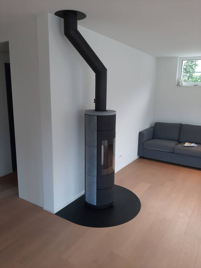 Poêle Cheminée Tipas Compact Powerbloc Pierre naturelle Exemple d’installation
