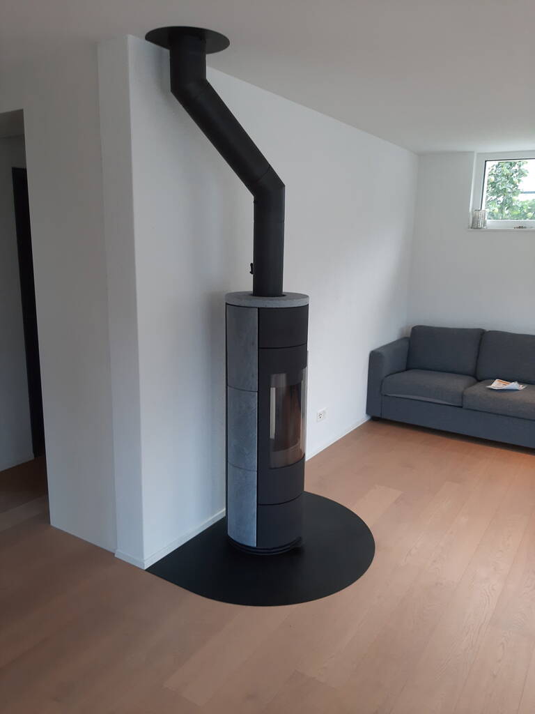Poêle Cheminée Tipas Compact Powerbloc Pierre naturelle Exemple d’installation