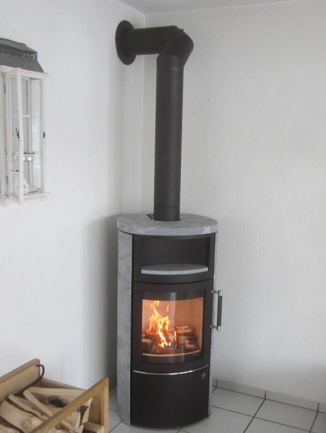Poêle Cheminée Hark 44-5.1 ECOplus Pierre naturelle Exemple d'installation
