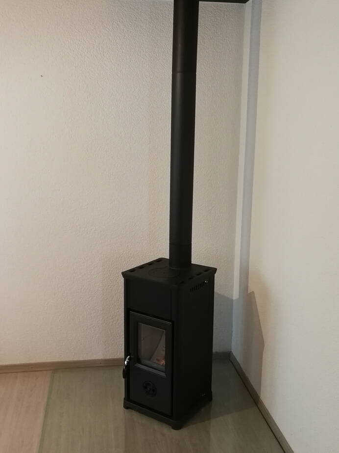 Poêle Cheminée Tea Acier noir ou blanc Exemple d’installation
