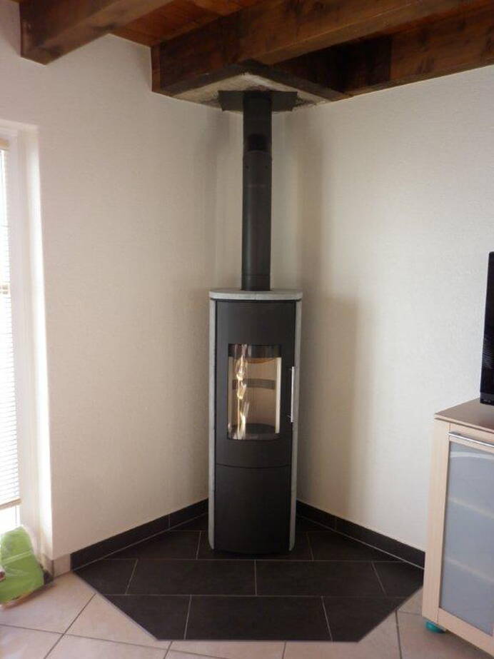 Poêle Cheminée Hark 106 H GT ECOplus Pierre naturelle, pierres d'accumulation inclus Exemple d’installation