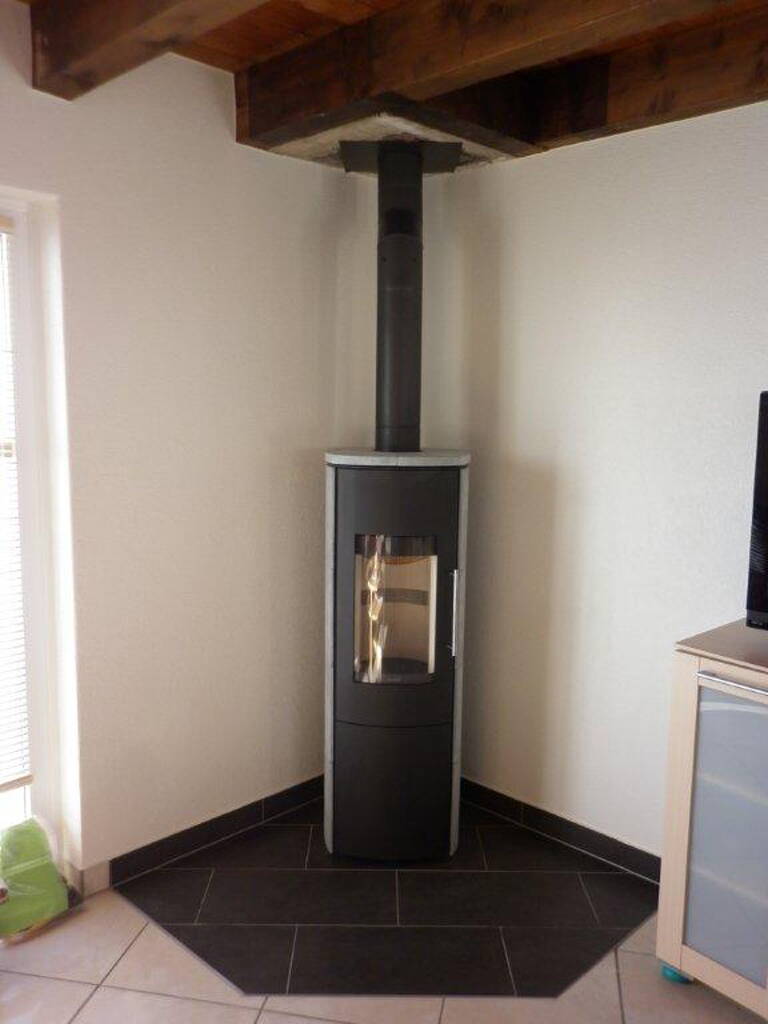 Poêle Cheminée Hark 106 H GT ECOplus Pierre naturelle, pierres d'accumulation inclus Exemple d’installation