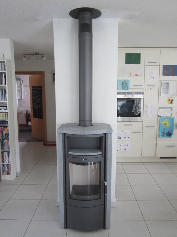 Poêle Cheminée Hark 57 EX ECOplus Pierre naturelle Exemple d’installation