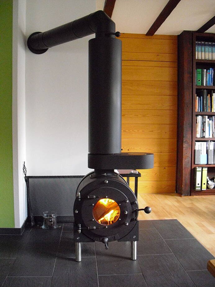 Poêle Cheminée Firetube Air Acier noir, module de base et changeur de chaleur Exemple d’installation